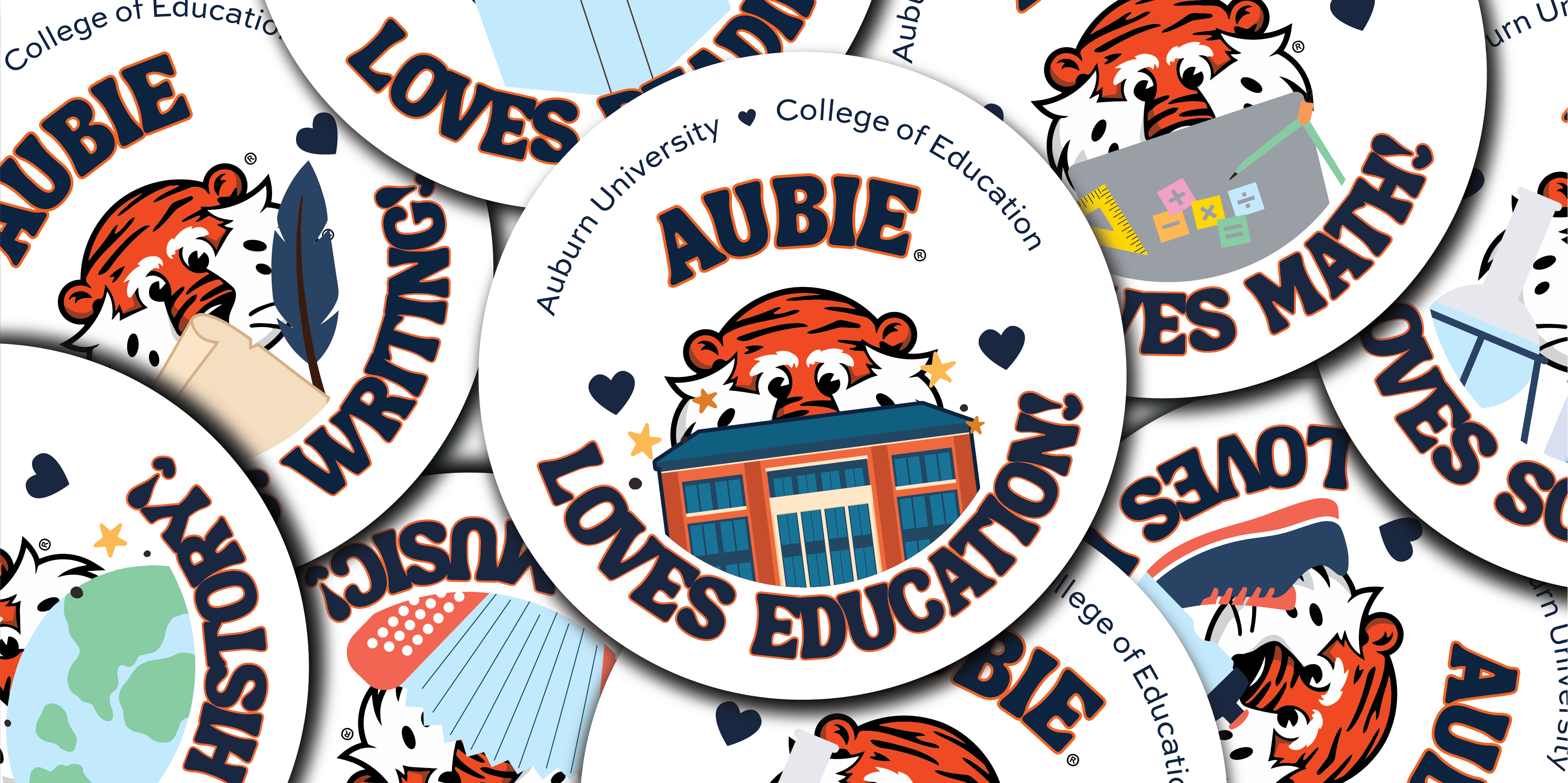 Aubie loves buttons with different academic subjects featured