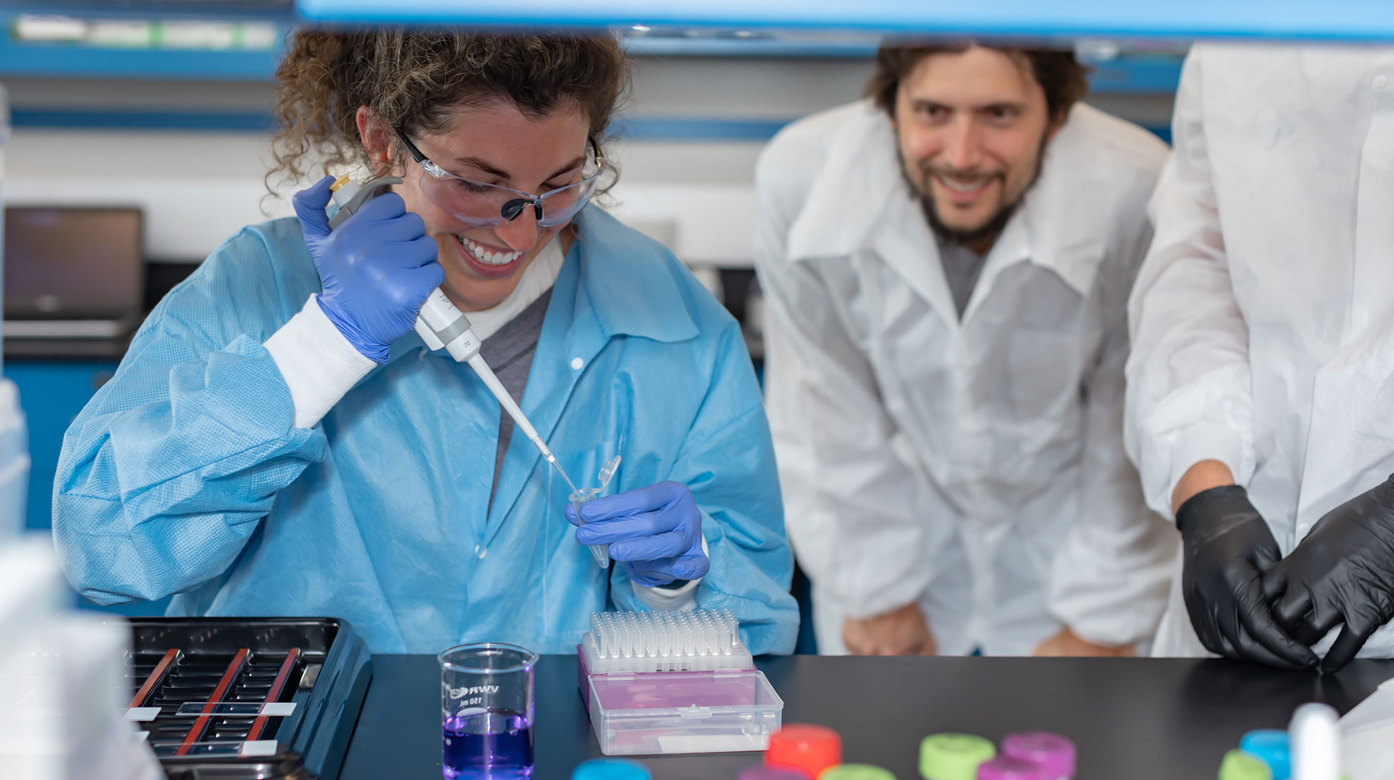 Students work with pipettes in the Nutrabolt lab.
