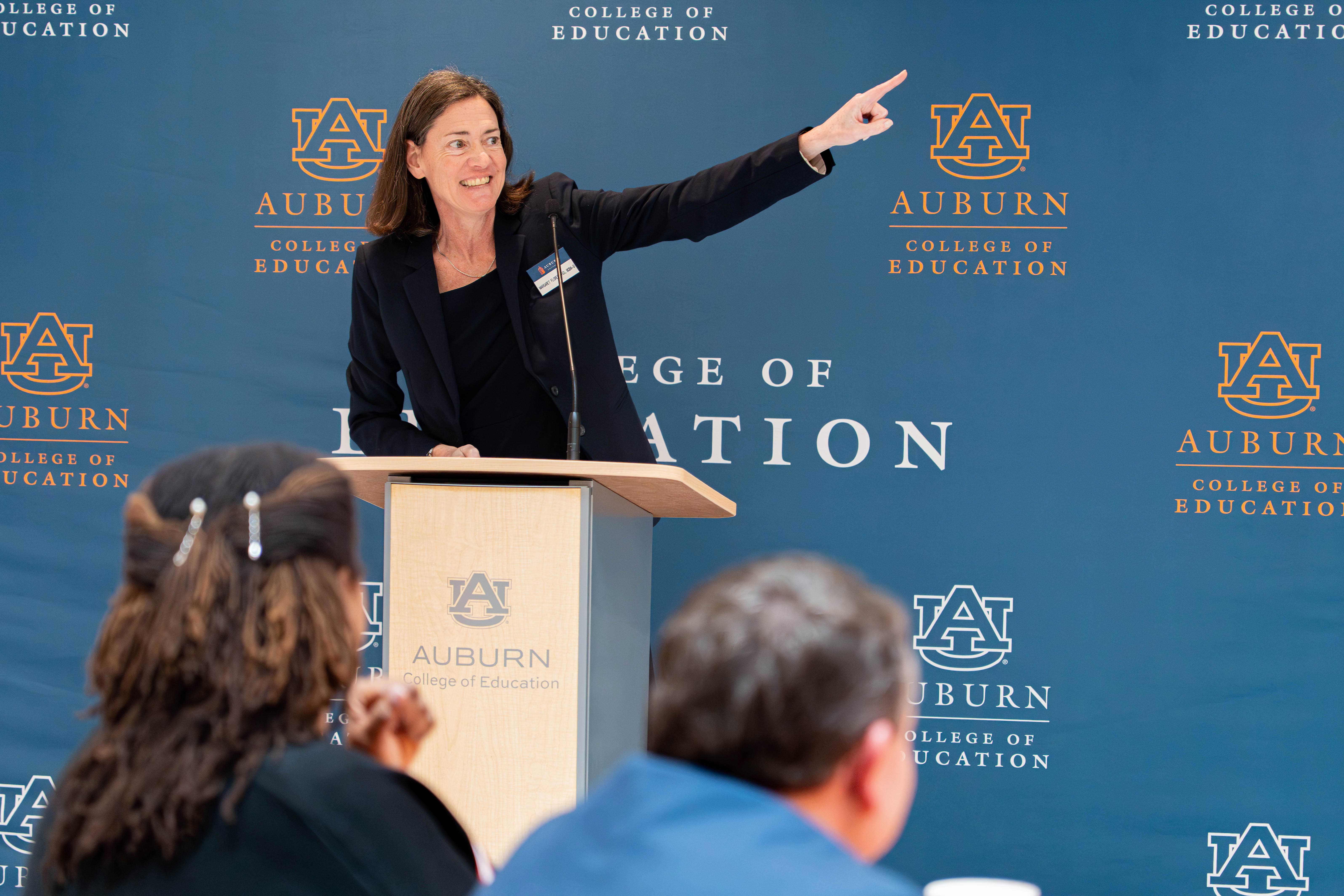 Dr. Flores speaks at the beginning of the Education Summit.