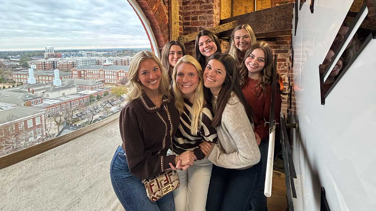 Student Council members pose in the samford hall clock tower