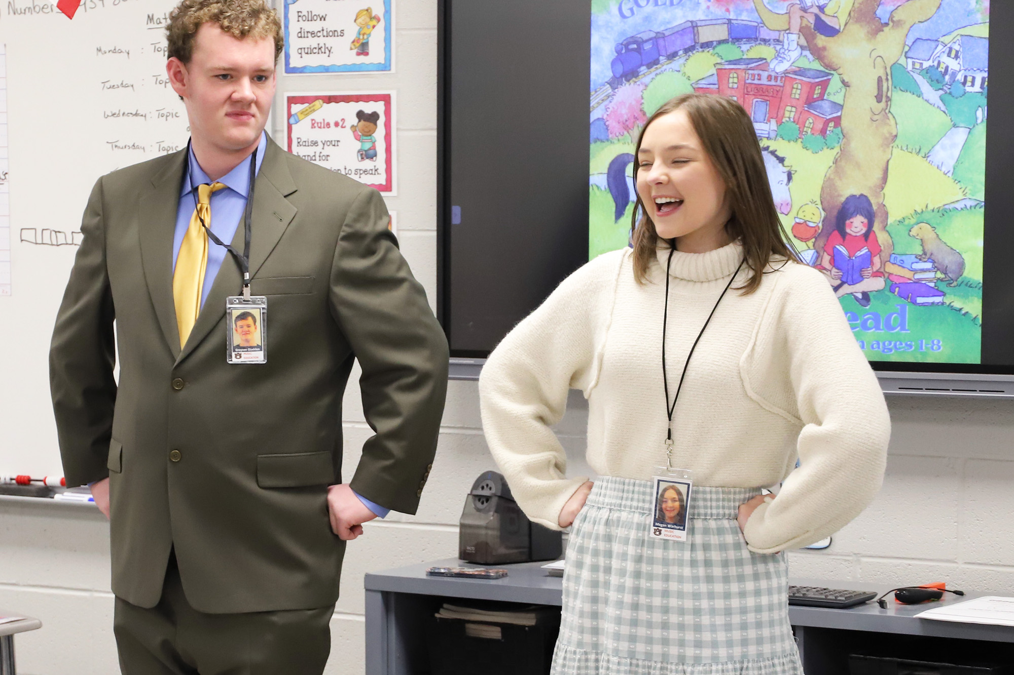 Student music teachers stand in front of their class