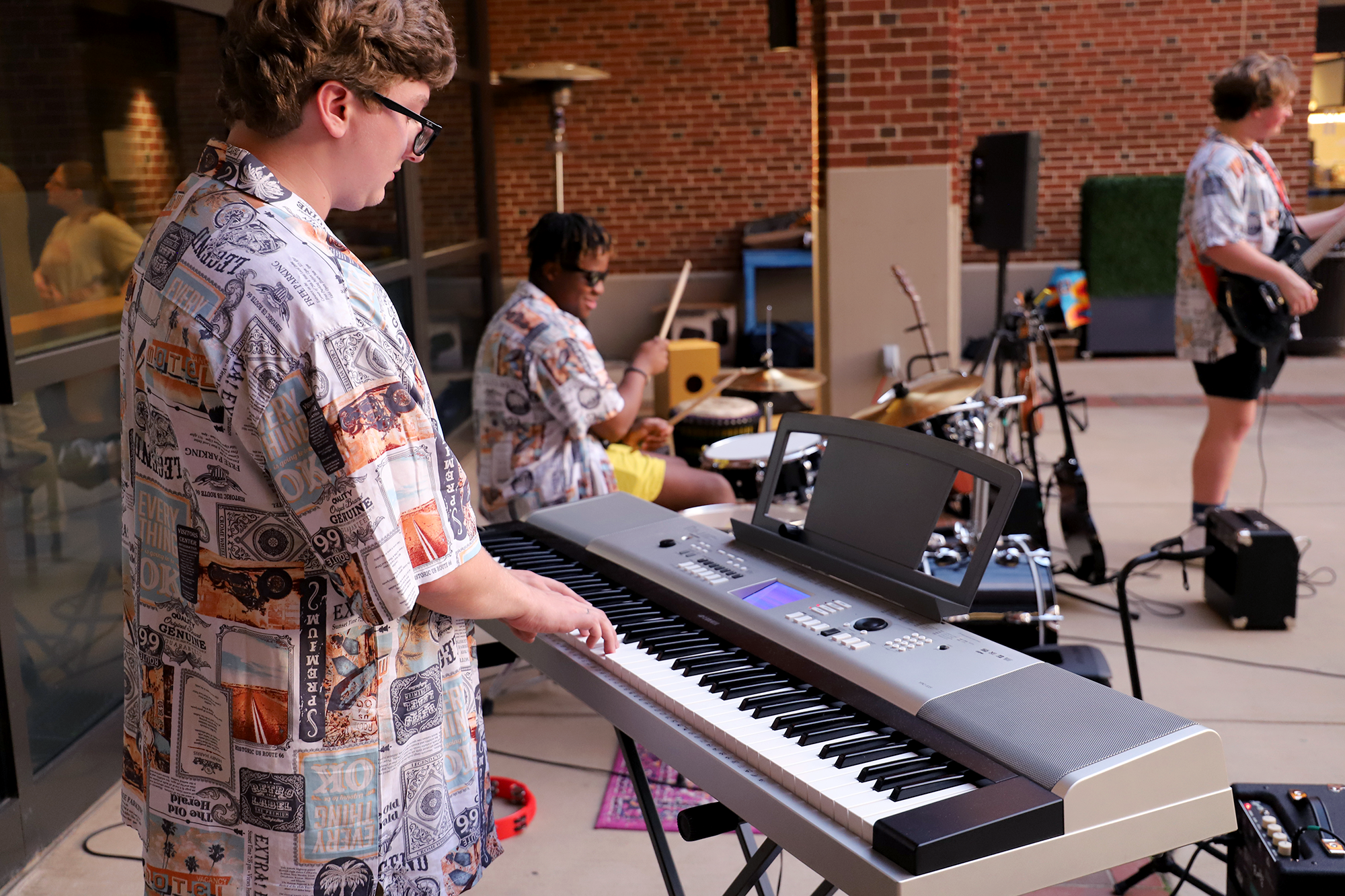Students play instruments on stage