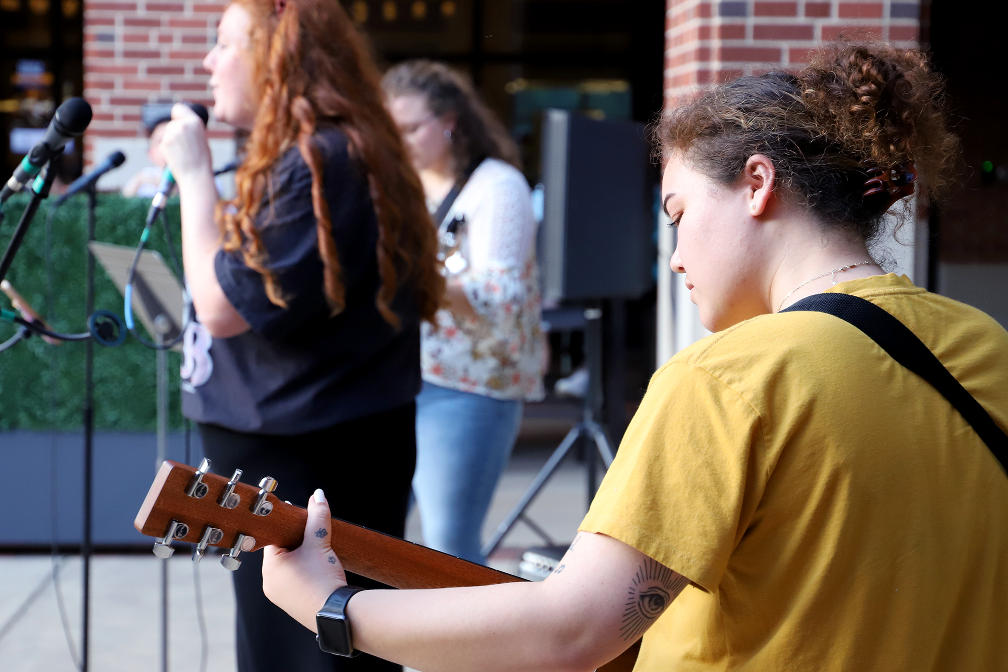 students perform in a band