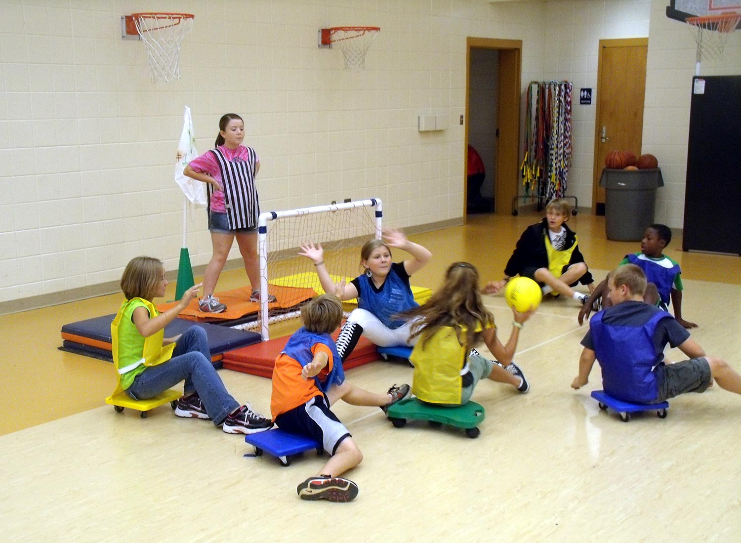 Kids listening to an instructor